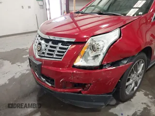 2016 Cadillac SRX Performance Collection z VIN 3GYFNCE32GS571230, wystawiony jako IAAI lot #42417263 z przebiegiem 59 634 mil mil oraz . Historia ofert i sprzedaży dostępna na DreamBid. Obrazek 6.