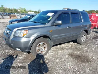 2007 Honda Pilot EX-L with VIN 2HKYF18727H528564, listed as a IAAI auction lot 42010708 with 260,364 mi miles and . Bid and sale history available at DreamBid. Image 2.