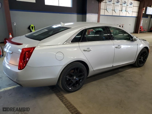 2013 Cadillac XTS with VIN 2G61N5S36D9163261, listed as a Copart auction lot 87350784 with 124,588 mi miles and Salvage Title. Bid and sale history available at carsss.com. Image 3.