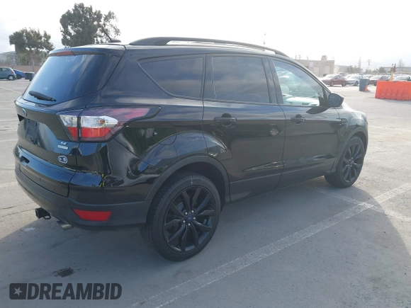 2017 Ford Escape SE with VIN 1FMCU0GDXHUC95845, listed as a IAAI auction lot 41850265 with 77,691 mi miles and . Bid and sale history available at carsss.com. Image 4.