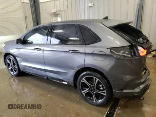 2021 Ford Edge ST z VIN 2FMPK4AP2MBA13683, wystawiony jako Copart lot #42028415 z przebiegiem 13 823 mil mil oraz Szkoda całkowita • Salvage title. Historia ofert i sprzedaży dostępna na DreamBid. Obrazek 2.
