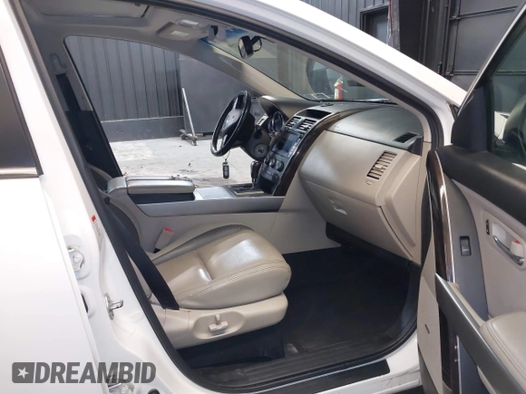 2011 Mazda CX-9 Grand Touring with VIN JM3TB3DV9B0320328, listed as a IAAI auction lot 41708356 with 132,629 mi miles. Bid and sale history available at carsss.com. Image 5.
