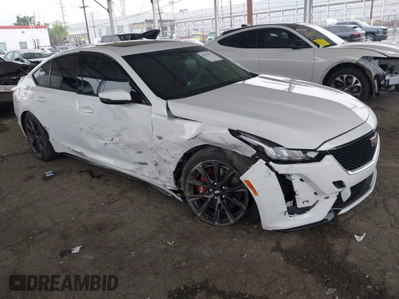 2021 Cadillac CT5 Sport z VIN 1G6DU5RK9M0117981, wystawiony jako IAAI lot #42021432 z przebiegiem 67 363 mil mil oraz . Historia ofert i sprzedaży dostępna na DreamBid. Obrazek 1.