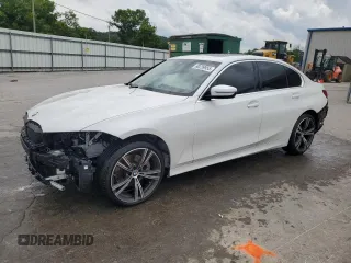 2024 BMW 3 Series 330i with VIN 3MW69FF01R8E32977, listed as a Copart auction lot 60239955 with 23,003 mi miles and Salvage title. Bid and sale history available at DreamBid. Image 1.