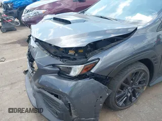 2023 Subaru WRX Premium z VIN JF1VBAF61P9802179, wystawiony jako IAAI lot #42824452 z przebiegiem 9 719 mil mil oraz . Historia ofert i sprzedaży dostępna na DreamBid. Obrazek 18.