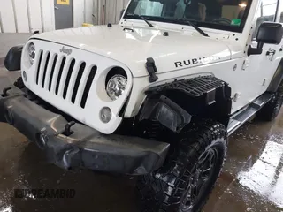2016 Jeep Wrangler Unlimited Rubicon with VIN 1C4HJWFG4GL127379, listed as a IAAI auction lot 41732688 with 110,193 mi miles. Bid and sale history available at carsss.com. Image 17.