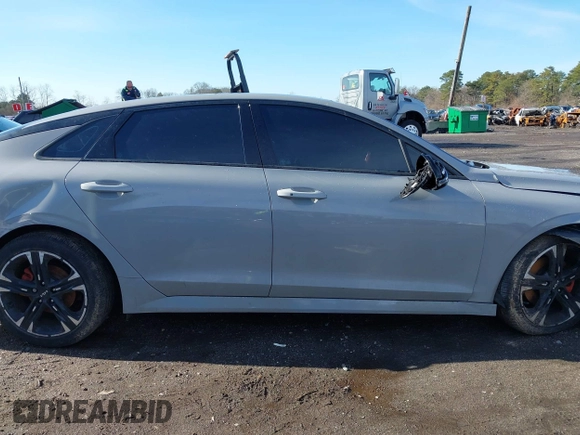 2023 Kia K5 GT-Line z VIN 5XXG64J28PG188506, wystawiony jako IAAI lot #41854184 z przebiegiem 18 967 mil mil oraz . Historia ofert i sprzedaży dostępna na DreamBid. Obrazek 13.