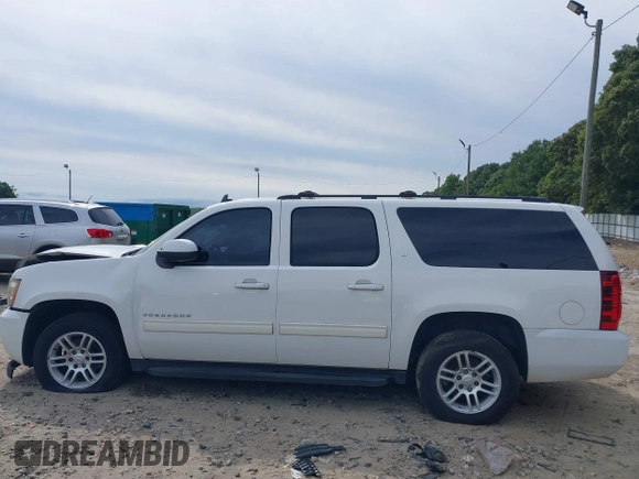 2014 Chevrolet Suburban LT with VIN 1GNSCJE08ER185472, listed as a IAAI auction lot 39849223 with 198,853 mi miles. Bid and sale history available at carsss.com. Image 14.