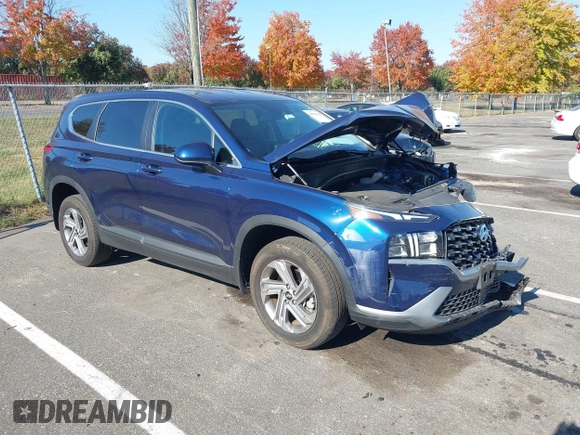2023 Hyundai Santa Fe SE z VIN 5NMS1DAJ0PH552080, wystawiony jako IAAI lot #40653004 z przebiegiem 5 982 mil mil oraz . Historia ofert i sprzedaży dostępna na DreamBid. Obrazek 1.