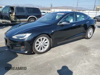 2017 Tesla Model S 60 с VIN 5YJSA1E14HF209736, выставлен на аукционе Copart как лот 62951675 с пробегом 94 389 миль миль и Списание • Salvage title. История ставок и продаж доступна на DreamBid. Изображение 1.