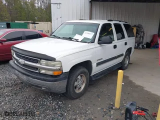 2003 Chevrolet Tahoe LT with VIN 1GNEC13Z63J126611, listed as a IAAI auction lot 41300437 with 313,885 mi miles. Bid and sale history available at carsss.com. Image 2.