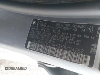2003 BMW 3 Series 330i with VIN WBAEV53463KM04252, listed as a IAAI auction lot 42006945 with 193,387 mi miles. Bid and sale history available at carsss.com. Image 9.