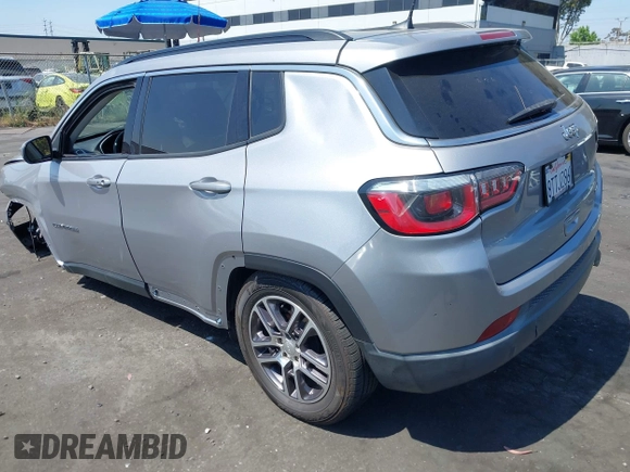 2018 Jeep Compass Latitude with VIN 3C4NJCBBXJT102753, listed as a IAAI auction lot 42379577 with 98,423 mi miles and . Bid and sale history available at DreamBid. Image 3.