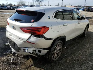 2018 BMW X2 sDrive28i with VIN WBXYJ3C34JEJ81876, listed as a Copart auction lot 45913425 with 89,796 mi miles and Salvage Title. Bid and sale history available at carsss.com. Image 3.