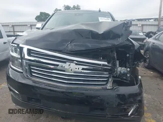 2018 Chevrolet Suburban Premier with VIN 1GNSCJKC9JR100504, listed as a IAAI auction lot 42276280 with 153,916 mi miles and . Bid and sale history available at DreamBid. Image 12.