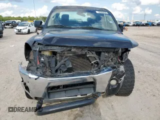 2008 Nissan Titan XE with VIN 1N6BA06A08N310084, listed as a Copart auction lot 58950565 with 208,055 mi miles and Salvage title. Bid and sale history available at DreamBid. Image 5.