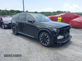 2024 Mazda CX-90 S z VIN JM3KK1HC5R1147677, wystawiony jako IAAI lot #42460899 z przebiegiem 39 151 mil mil oraz . Historia ofert i sprzedaży dostępna na DreamBid. Obrazek 1.