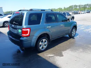 2011 Ford Escape Limited with VIN 1FMCU0EG0BKA61472, listed as a IAAI auction lot 41982614 with 291,808 mi miles. Bid and sale history available at carsss.com. Image 4.