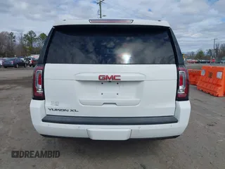 2015 GMC Yukon XL SLT with VIN 1GKS1HKC7FR126375, listed as a IAAI auction lot 41689017 with 218,622 mi miles. Bid and sale history available at carsss.com. Image 16.