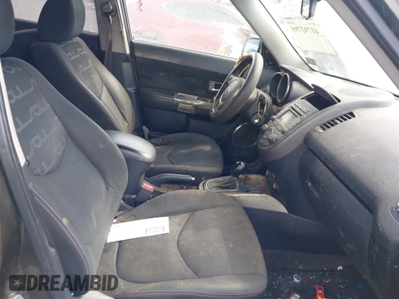 2012 Kia Soul + with VIN KNDJT2A60C7392564, listed as a IAAI auction lot 41702795 with 147,282 mi miles. Bid and sale history available at carsss.com. Image 5.