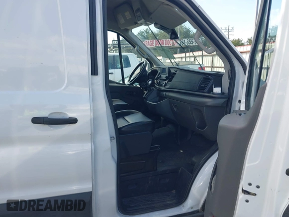 2023 Ford Transit Cargo with VIN 1FTBR1C87PKA63830, listed as a IAAI auction lot 40797669 with 69,162 mi miles and . Bid and sale history available at DreamBid. Image 5.