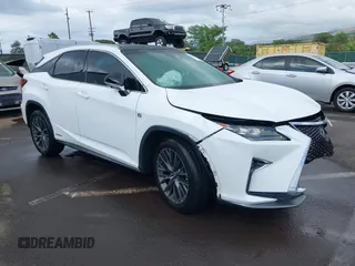 2016 Lexus RX 450h with VIN 2T2BGMCA9GC006844, listed as a IAAI auction lot 41633755 with 44,464 mi miles and . Bid and sale history available at DreamBid. Image 1.