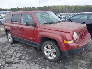 2013 Jeep Patriot Latitude with VIN 1C4NJPFA3DD237804, listed as a IAAI auction lot 41876591 with 73,852 mi miles. Bid and sale history available at carsss.com. Image 1.