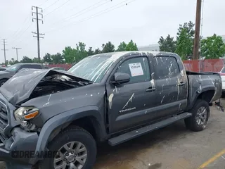 2017 Toyota Tacoma SR5 z VIN 3TMAZ5CN0HM039730, wystawiony jako IAAI lot #42406448 z przebiegiem 69 530 mil mil oraz . Historia ofert i sprzedaży dostępna na DreamBid. Obrazek 15.