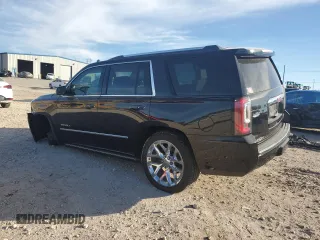 2020 GMC Yukon Denali with VIN 1GKS1CKJ6LR301972, listed as a Copart auction lot 80930524 with 64,215 mi miles and Salvage Title. Bid and sale history available at carsss.com. Image 2.