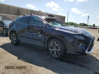 2019 Lexus RX with VIN 2T2BZMCA5KC210642, listed as a Copart auction lot 52940634 with 34,966 mi miles and Salvage Title. Bid and sale history available at carsss.com. Image 4.