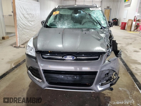 2015 Ford Escape Titanium with VIN 1FMCU9J93FUC86300, listed as a Copart auction lot 60852895 with 156,296 mi miles and Salvage title. Bid and sale history available at DreamBid. Image 5.