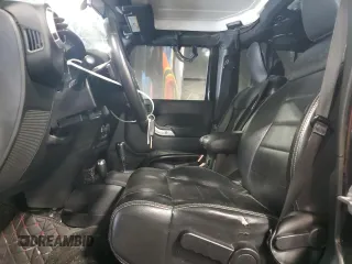 2012 Jeep Wrangler Unlimited Sahara with VIN 1C4BJWEG8CL235893, listed as a Copart auction lot 58195585 with 142,179 mi miles and Salvage title. Bid and sale history available at DreamBid. Image 7.