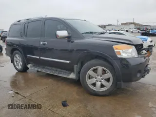 2014 Nissan Armada Platinum z VIN 5N1BA0NF5EN601168, wystawiony jako Copart lot #44590395 z przebiegiem Nie podano mil oraz Szkoda całkowita • Salvage title. Historia ofert i sprzedaży dostępna na DreamBid. Obrazek 4.