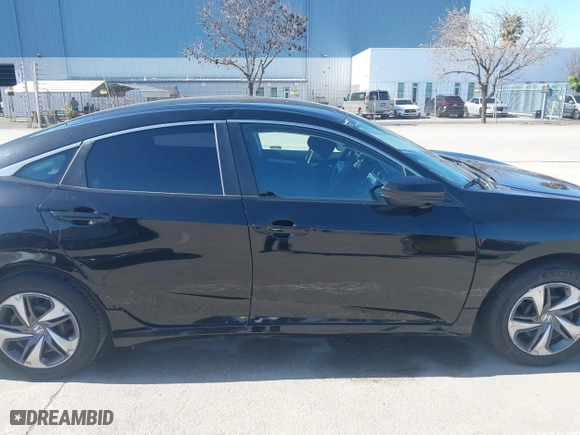 2019 Honda Civic Sedan LX with VIN 2HGFC2F61KH561199, listed as a IAAI auction lot 41754093 with 43,779 mi miles. Bid and sale history available at carsss.com. Image 14.