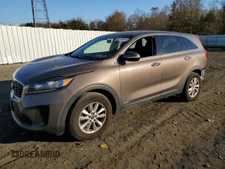 2019 Kia Sorento LX z VIN 5XYPGDA33KG574406, wystawiony jako Copart lot #80110544 z przebiegiem 57 041 mil mil oraz Szkoda całkowita • Salvage title. Historia ofert i sprzedaży dostępna na DreamBid. Obrazek 1.