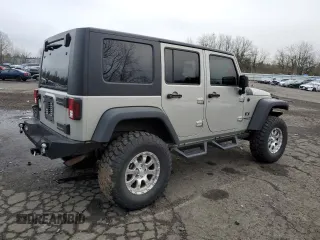 2007 Jeep Wrangler Unlimited X with VIN 1J4GA39177L105582, listed as a Copart auction lot 88912935 with 156,156 mi miles and Salvage Title. Bid and sale history available at DreamBid. Image 3.