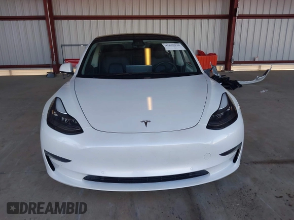 2021 Tesla Model 3 Long Range with VIN 5YJ3E1EB3MF003027, listed as a IAAI auction lot 41859036 with 102,302 mi miles and . Bid and sale history available at carsss.com. Image 13.