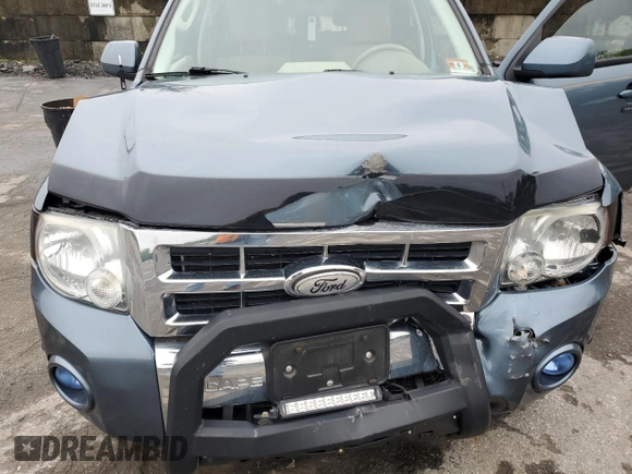 2010 Ford Escape Limited with VIN 1FMCU9EG1AKC75518, listed as a Copart auction lot 61332425 with 90,017 mi miles and Salvage title. Bid and sale history available at DreamBid. Image 12.