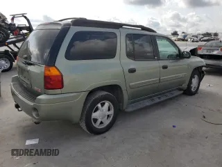 2003 GMC Envoy SLE with VIN 1GKES16P636242632, listed as a Copart auction lot 75960974 with Not Provided miles and Salvage Title. Bid and sale history available at DreamBid. Image 3.