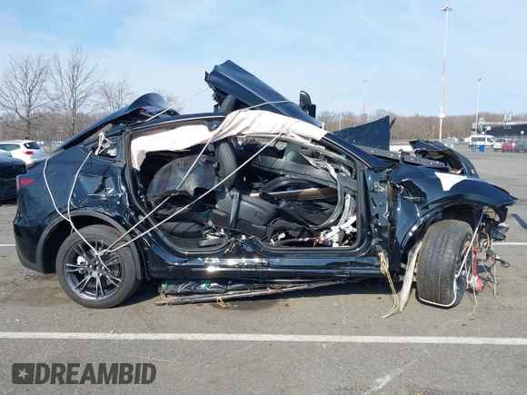 2024 Tesla Model Y Long Range with VIN 7SAYGDEE4RF149894, listed as a IAAI auction lot 41771185 with Not Provided miles and . Bid and sale history available at DreamBid. Image 12.
