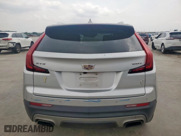 2019 Cadillac XT4 FWD Premium Luxury with VIN 1GYFZCR47KF175802, listed as a Copart auction lot 57153785 with 33,308 mi miles and Salvage title. Bid and sale history available at DreamBid. Image 6.