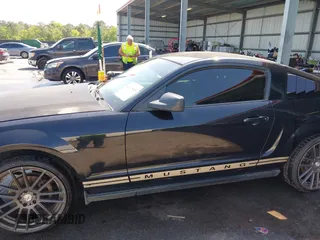 2005 Ford Mustang Deluxe with VIN 1ZVFT80N455122217, listed as a IAAI auction lot 42015083 with 154,396 mi miles. Bid and sale history available at carsss.com. Image 6.