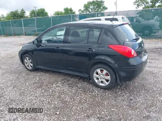 2009 Nissan Versa 1.8 S with VIN 3N1BC13E79L354341, listed as a IAAI auction lot 42079896 with 118,797 mi miles. Bid and sale history available at carsss.com. Image 3.