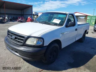 1999 Ford F-150 Work Series with VIN 1FTZF172XXNA84005, listed as a IAAI auction lot 41683608 with 289,294 mi miles. Bid and sale history available at carsss.com. Image 2.
