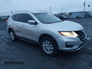 2019 Nissan Rogue SV with VIN KNMAT2MV2KP519056, listed as a IAAI auction lot 41236014 with 113,031 mi miles. Bid and sale history available at carsss.com. Image 1.