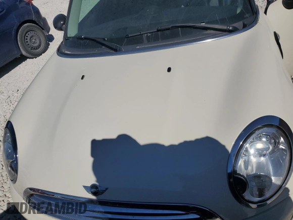 2013 MINI Hardtop with VIN WMWSU3C56DT682857, listed as a Copart auction lot 77677234 with 92,625 mi miles and Clean Title. Bid and sale history available at DreamBid. Image 11.