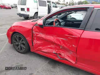 2019 Honda Civic Sport with VIN 2HGFC2F8XKH585650, listed as a IAAI auction lot 42043354 with 116,412 mi miles and . Bid and sale history available at DreamBid. Image 6.