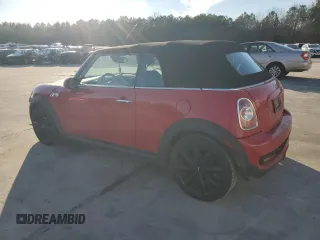 2013 MINI Convertible S with VIN WMWZP3C50DT550554, listed as a Copart auction lot 88415495 with 95,295 mi miles and Salvage title. Bid and sale history available at DreamBid. Image 2.