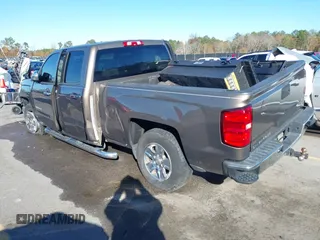 2014 Chevrolet Silverado 1500 LT with VIN 1GCRCREH5EZ165367, listed as a IAAI auction lot 41076729 with 130,425 mi miles and . Bid and sale history available at DreamBid. Image 3.