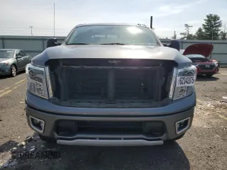 2018 Nissan Titan SV with VIN 1N6AA1E50JN514802, listed as a Copart auction lot 62342875 with 101,593 mi miles and Salvage title. Bid and sale history available at DreamBid. Image 5.